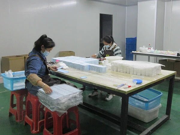 Workers Assemble Car Vent Fragrance Clips - FEILIZTECH Car Diffuser Production